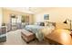 Spacious main bedroom with plush bedding and access to a patio at 8638 E Paraiso Dr, Scottsdale, AZ 85255
