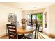 Dining room with wooden table and chairs, near kitchen at 8638 E Paraiso Dr, Scottsdale, AZ 85255