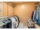 Large walk-in closet with ample shelving and hanging space at 8638 E Paraiso Dr, Scottsdale, AZ 85255