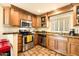 Updated kitchen with stainless steel appliances and granite countertops at 8638 E Paraiso Dr, Scottsdale, AZ 85255