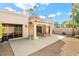 Landscaped backyard with a spacious patio and covered seating area at 8638 E Paraiso Dr, Scottsdale, AZ 85255
