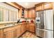 Well-equipped kitchen with ample cabinetry and granite counters at 8638 E Paraiso Dr, Scottsdale, AZ 85255