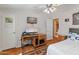 Bedroom with a wooden desk and ceiling fan at 11596 W Sierra Dawn Blvd # 377, Surprise, AZ 85378