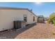 Home exterior and backyard with gravel and shed at 11596 W Sierra Dawn Blvd # 377, Surprise, AZ 85378