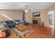 Spacious living room with a sectional sofa and a fireplace at 11596 W Sierra Dawn Blvd # 377, Surprise, AZ 85378