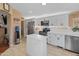 Spacious kitchen with white cabinets, stainless steel appliances, and an island at 11596 W Sierra Dawn Blvd # 377, Surprise, AZ 85378