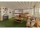 Sunroom with wood furniture and fireplace at 11596 W Sierra Dawn Blvd # 377, Surprise, AZ 85378