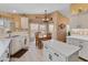 Bright kitchen featuring white cabinets and a breakfast nook at 11596 W Sierra Dawn Blvd # 377, Surprise, AZ 85378