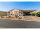 Front view of the house with carport and desert landscaping at 11596 W Sierra Dawn Blvd # 377, Surprise, AZ 85378