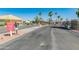 Gated entrance to the community with security features at 11596 W Sierra Dawn Blvd # 377, Surprise, AZ 85378