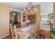 Open dining room with a view into the living room and kitchen at 11596 W Sierra Dawn Blvd # 377, Surprise, AZ 85378