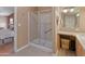 Bathroom with shower, vanity, and tiled floor at 11596 W Sierra Dawn Blvd # 377, Surprise, AZ 85378