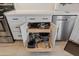 Well-organized kitchen drawers with various pots and pans at 11596 W Sierra Dawn Blvd # 377, Surprise, AZ 85378