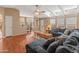 Living area featuring a sectional sofa and wood flooring at 11596 W Sierra Dawn Blvd # 377, Surprise, AZ 85378
