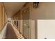 Long hallway with white walls and security door at 11596 W Sierra Dawn Blvd # 377, Surprise, AZ 85378