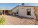 Exterior view of the house, showing the backyard and AC unit at 11596 W Sierra Dawn Blvd # 377, Surprise, AZ 85378