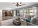 Open concept living room with adjacent kitchen and cozy seating at 4882 E Amarillo Dr, San Tan Valley, AZ 85140