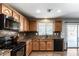 Bright kitchen with granite counters, ample cabinets, and backyard access at 4882 E Amarillo Dr, San Tan Valley, AZ 85140
