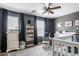 Adorable Bedroom with crib, dresser, rocking chair, and plenty of storage at 4882 E Amarillo Dr, San Tan Valley, AZ 85140