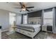 Bright main bedroom with large bed, ensuite bathroom access, and plenty of natural light at 4882 E Amarillo Dr, San Tan Valley, AZ 85140