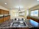 Kitchen island with double sink and views into Gathering room at 36085 W Catalan St, Maricopa, AZ 85138