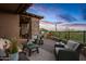 Spacious patio with seating area, offering stunning sunset views at 39115 N 99Th Pl, Scottsdale, AZ 85262