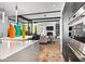 Modern kitchen boasts expansive island, high-end appliances, and open layout at 39115 N 99Th Pl, Scottsdale, AZ 85262