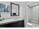 Clean bathroom with modern vanity and glass shower at 39115 N 99Th Pl, Scottsdale, AZ 85262