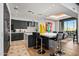 Contemporary kitchen with a center island and high-end appliances at 39115 N 99Th Pl, Scottsdale, AZ 85262