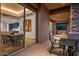 Covered patio with partial view into dining area at 39115 N 99Th Pl, Scottsdale, AZ 85262