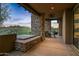 Covered patio with hot tub and scenic desert landscape at 39115 N 99Th Pl, Scottsdale, AZ 85262