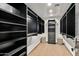 Large walk-in closet with ample shelving and hanging space at 39115 N 99Th Pl, Scottsdale, AZ 85262