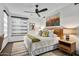 Serene bedroom with wood accents and natural light at 39115 N 99Th Pl, Scottsdale, AZ 85262