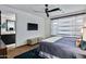 Bright bedroom with ensuite bathroom and large window at 39115 N 99Th Pl, Scottsdale, AZ 85262