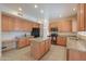 Spacious kitchen featuring granite countertops and ample cabinetry at 695 W Estrella Dr, Gilbert, AZ 85233