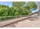 Private balcony overlooking lush trees at 695 W Estrella Dr, Gilbert, AZ 85233