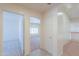 Hallway with access to bedrooms and a loft area at 695 W Estrella Dr, Gilbert, AZ 85233