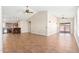 Spacious living room with tile floors and kitchen views at 18112 W Spencer Dr, Surprise, AZ 85374