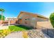 Home exterior showcasing backyard and landscaping at 18112 W Spencer Dr, Surprise, AZ 85374
