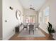 Bright dining area with patio access and seating for four at 18112 W Spencer Dr, Surprise, AZ 85374