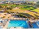 Community pool and surrounding golf course at 18112 W Spencer Dr, Surprise, AZ 85374