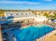Community lap pool with surrounding lounge area at 18112 W Spencer Dr, Surprise, AZ 85374