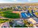 Aerial view showing community park with baseball field and pickleball courts at 18112 W Spencer Dr, Surprise, AZ 85374