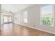 Spacious dining room with tile flooring and large windows at 18112 W Spencer Dr, Surprise, AZ 85374