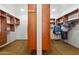 Large walk-in closet with ample shelving and hanging space at 29537 N 155Th Ave, Surprise, AZ 85387