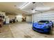 Spacious garage with ample storage space for cars and equipment at 29537 N 155Th Ave, Surprise, AZ 85387