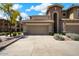 Exterior view of a two-story home with attached garage at 21320 N 56Th St # 2145, Phoenix, AZ 85054