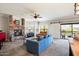 Relaxing living room with fireplace and sliding glass doors at 21320 N 56Th St # 2145, Phoenix, AZ 85054