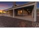 Covered patio with exterior lighting, adjacent to home at 29315 N 140Th St, Scottsdale, AZ 85262