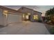 View of the home's exterior, showcasing the garage and front entrance at 10109 E Trailhead Ct, Gold Canyon, AZ 85118